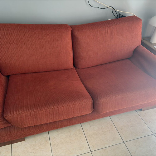 Orange sofa like new, comfortable and soft