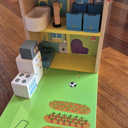 Peppa the Pig toys used with caravan, wooden house and George bag