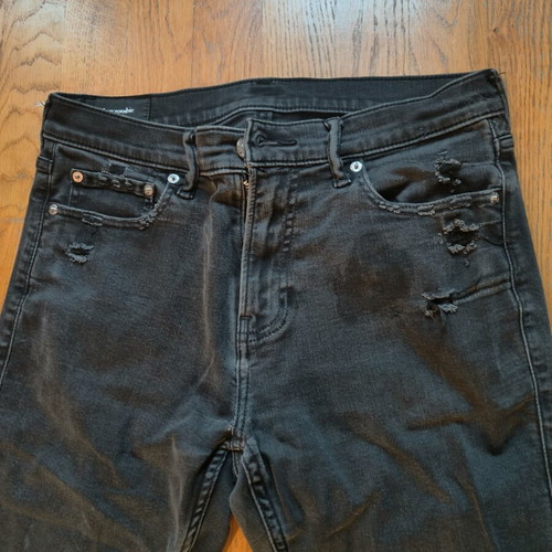 Abercrombie & Fitch black washed jeans used, stain on front, size S