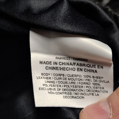 Nike women's leather shorts, size S, black