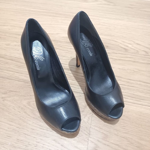 Peep toe heels used, leather with animal print platform