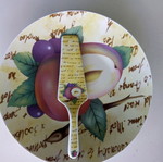 Ceramic serving platter with matching spatula, fruit design