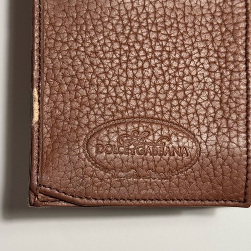Dolce & Gabbana wallet used with leopard pattern and brown leather