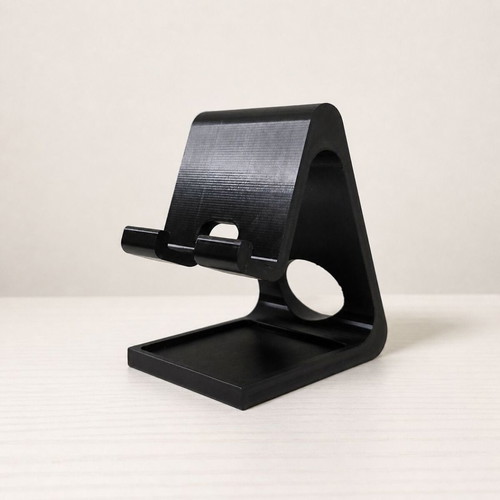 3D Phone Stand with Earphone Holder like new