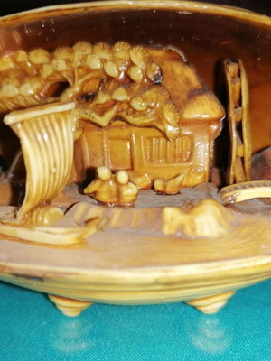Vintage carved shell with dragon and scenic details