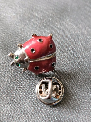 Small ladybug pin like new, burgundy with black spots