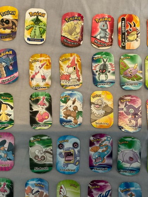 Pokemon metal tags collection of 35 pieces like new