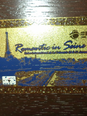Metallic phone card used, empty, 11 g