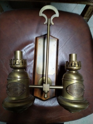 Wall light fixture used, double wood and brass applique