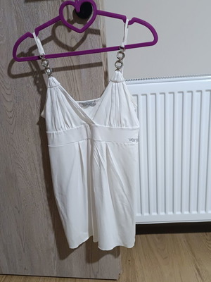 White sleeveless top with silver details