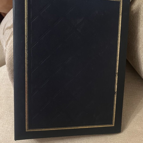 Photo album like new, leatherette cover