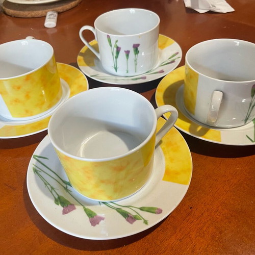 Porcelain serving set with 4 glasses and saucers like new