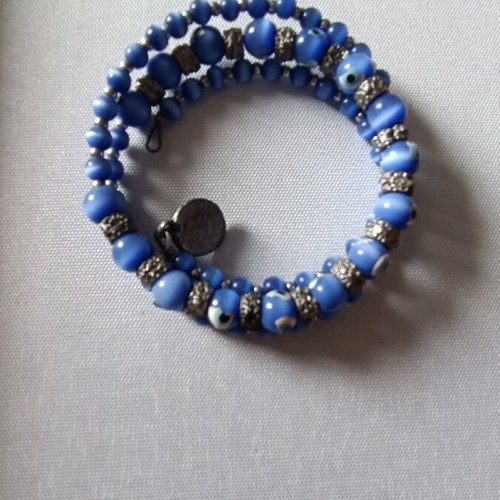 Bracelet handcuff like new with blue stones