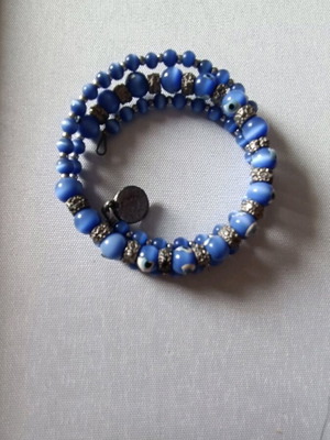 Bracelet handcuff like new with blue stones