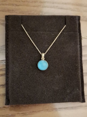 Silver pendant new with blue stone