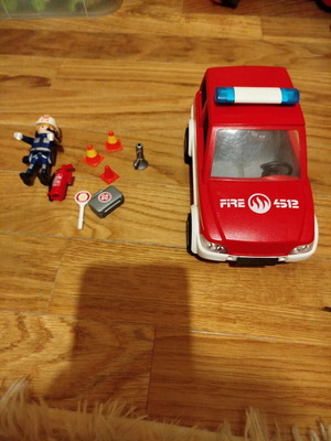 Playmobil fire truck used with figure and accessories