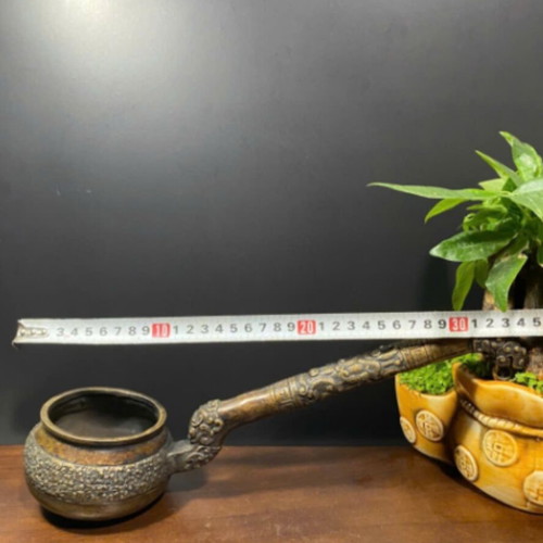 Antique Vietnamese bronze vessel used with dragon and floral design