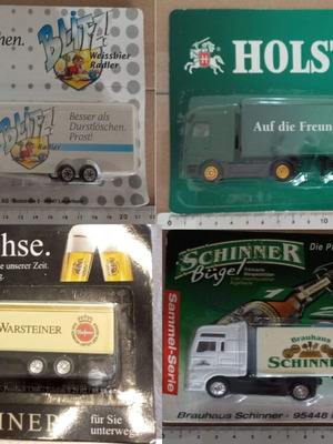 Set of 4 H0 scale beer advertising trucks