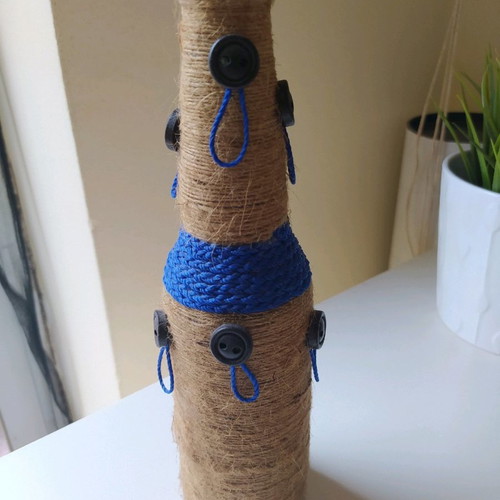 Decorative bottle for earrings new, handmade with 9 loops