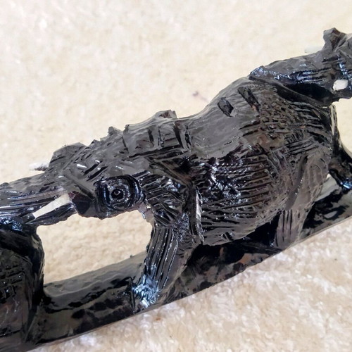 African wood carving with elephants like new, ebony wood