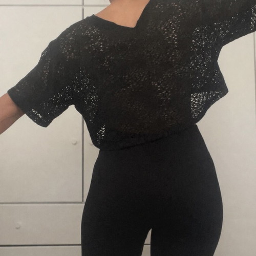 Black perforated blouse like new, medium size, loose fit