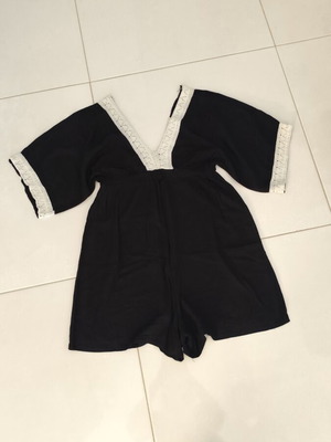 One-piece shorts romper used, black and white, size S