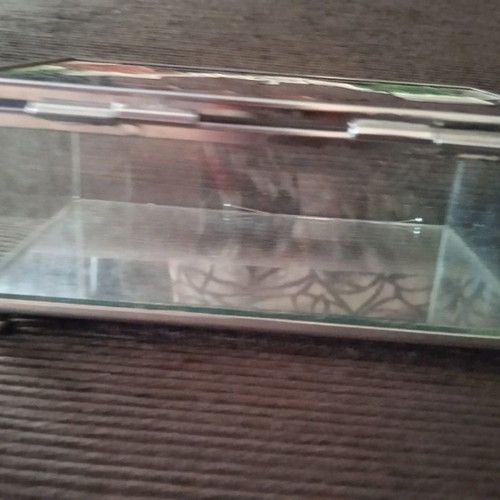 Stained glass jewelry box used with embossed colors and mirror base