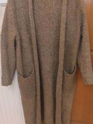Long knitted cardigan with fringes