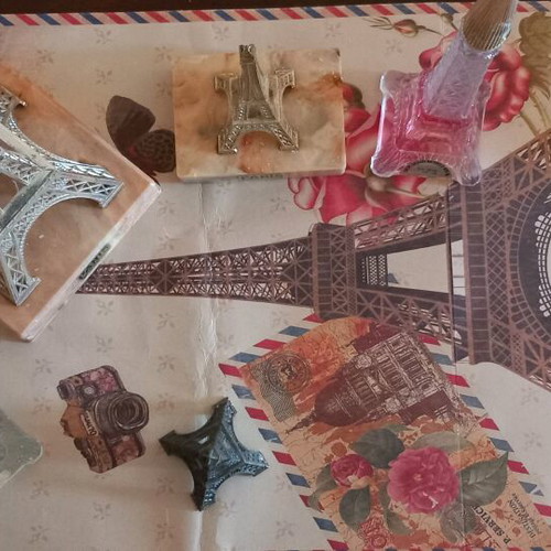 Collection of 5 Eiffel Tower souvenirs made of synthetic, metal, and glass