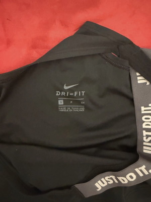 Nike sports top, black, size S