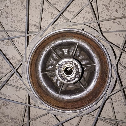 Motorcycle rim used, old with surface rust and missing spoke
