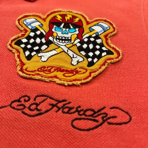 Ed Hardy men's orange polo shirt used with skull backprint
