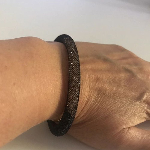 Swarovski women's bracelet like new, black and brown