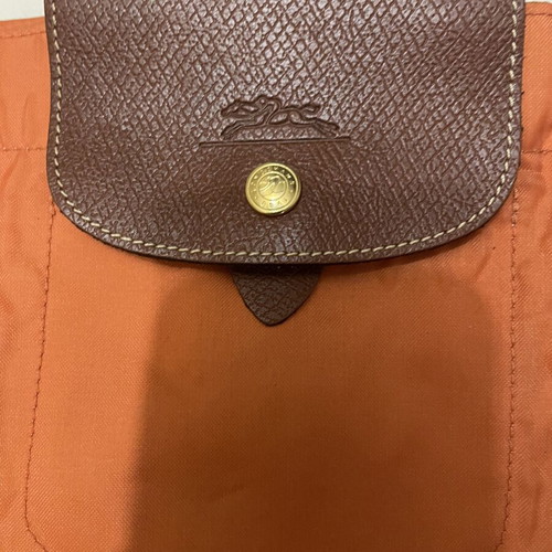 Longchamp Le Pliage backpack used, orange