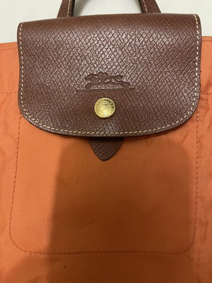 Longchamp Le Pliage backpack used, orange