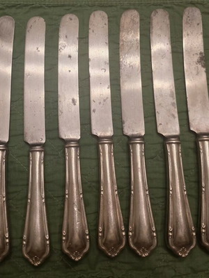Vintage Silco Set of 11 Butter Knives like new