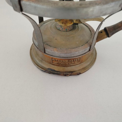 Pitsos Freres brass gas stove used with wooden handle
