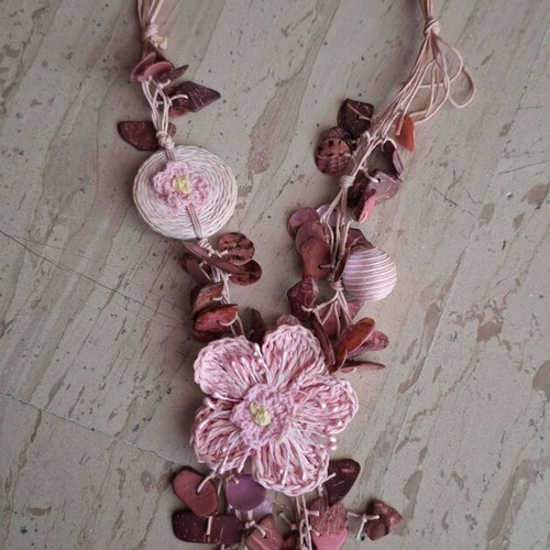Handmade long necklace with crocheted pink flower and shells