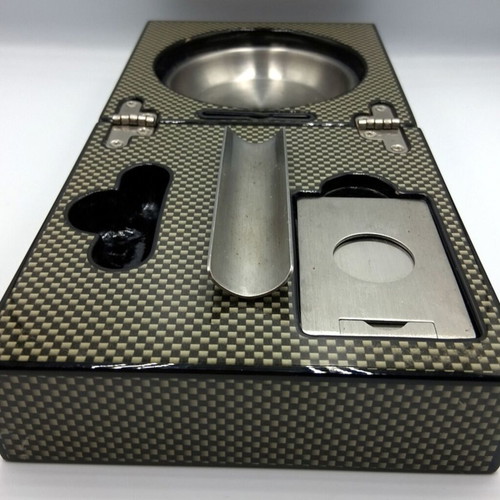 Cigar accessory set box like new with carbon fiber finish