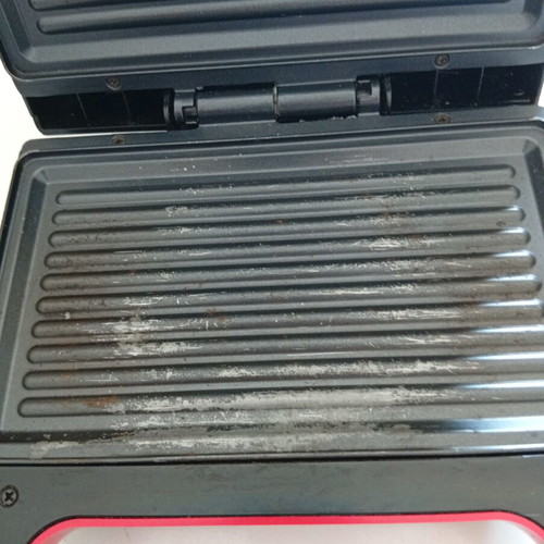 Izzy Milano EL-225A sandwich maker used with plate wear
