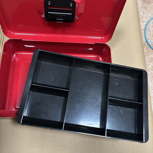 Red metal cash box with lock and key