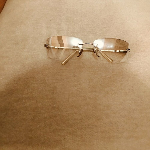 Salvatore Ferragamo sunglasses authentic, like new, clear silver rimless