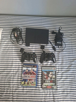 PlayStation 2 Slim κονσόλα σαν καινούργιο με 2 χειριστήρια, 2 παιχνίδια και memory card