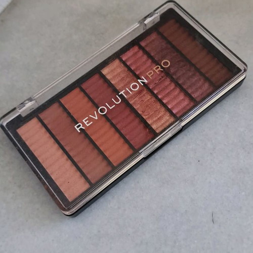 Revolution eyeshadow palette used, warm colors