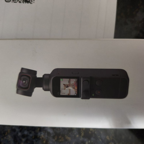 DJI Osmo Pocket 2 like new with tripod and phone holder set