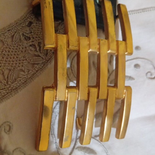 Vintage leather belt with impressive gold buckle used