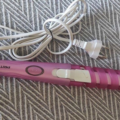 Portable hair curler like new
