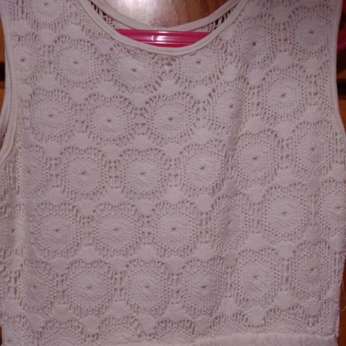 Two white dresses used, sizes 12-14 for girls