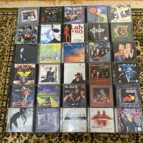 Various used pop CDs