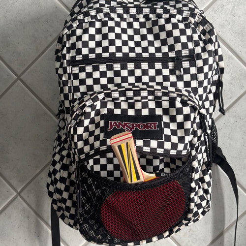 Jansport black and white checkerboard backpack with laptop compartment